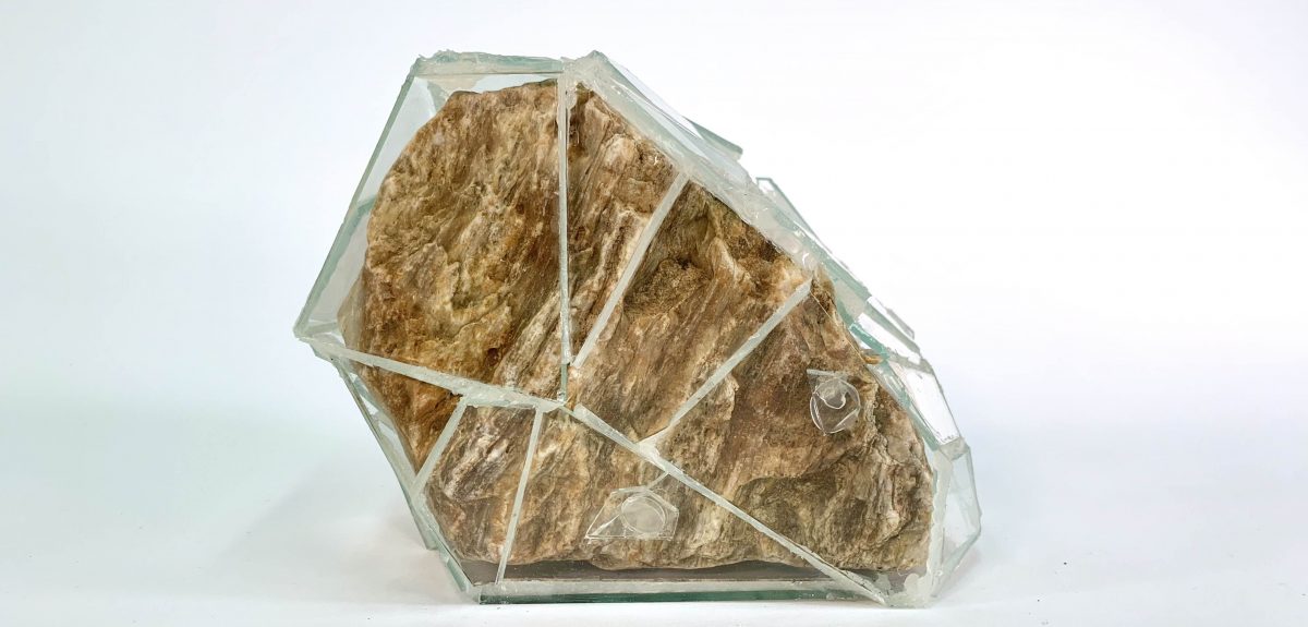 An image of a glass encased rock.